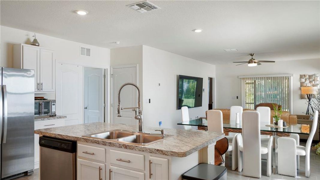 Furnished interior view inside a new home in Charles Cove Express, Davenport (Image 12).
