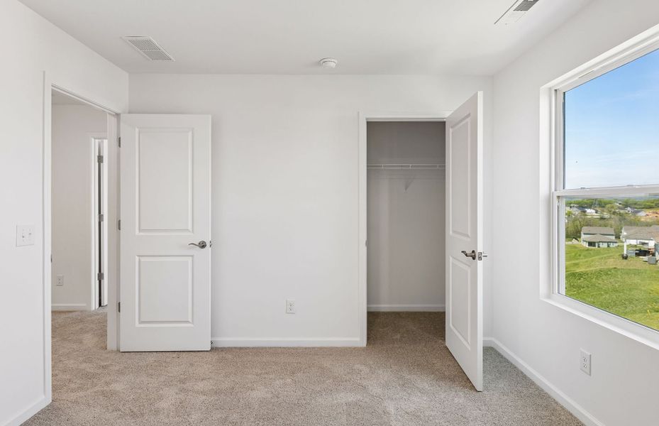 Spacious, unfurnished interior of a new home in Highlands of Carter's Station, Columbia (Image 27).