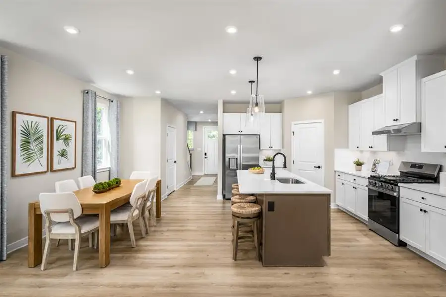 Representative furnished interior of a home built from the Geneva with 3 Car Garage by Ryan Homes in Middle Creek Village, Bolivia (Image 8).