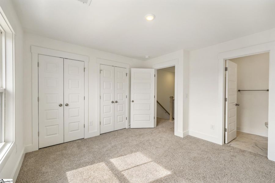 Spacious, unfurnished interior of a new home in Renaissance Place, Greenville (Image 20).