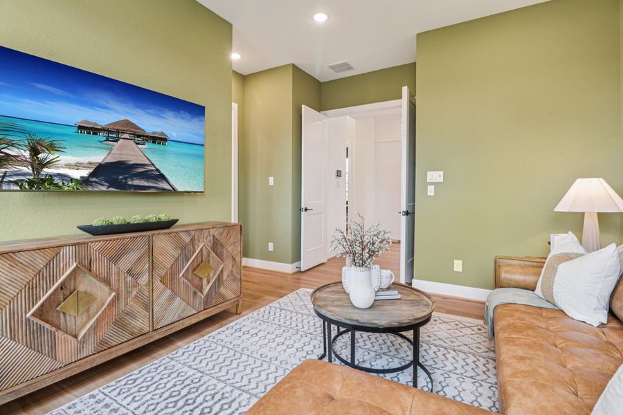 Representative furnished interior of a home built from the Lauren by Chesmar Homes in Grange, Katy (Image 14).