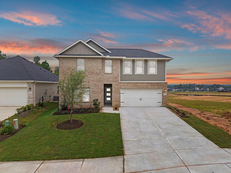 Front exterior of a new home in Westridge Cove, Conroe, TX, highlighting curb appeal (Image 19).