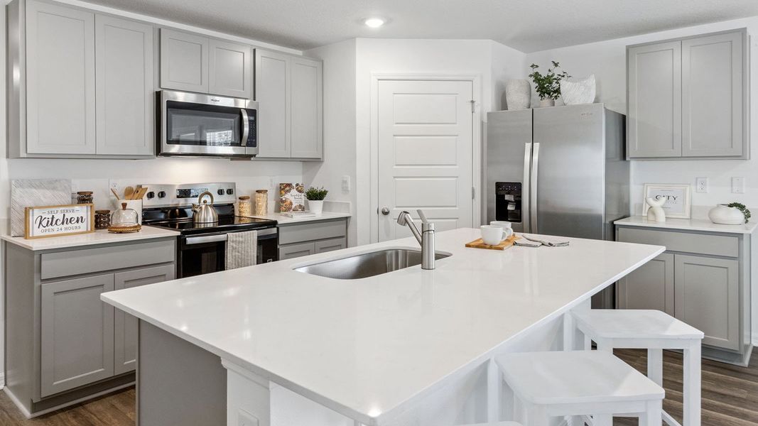 Representative furnished interior of a home built from the Dundee by D.R. Horton in Leoma's Landing, Lake Wales (Image 15).