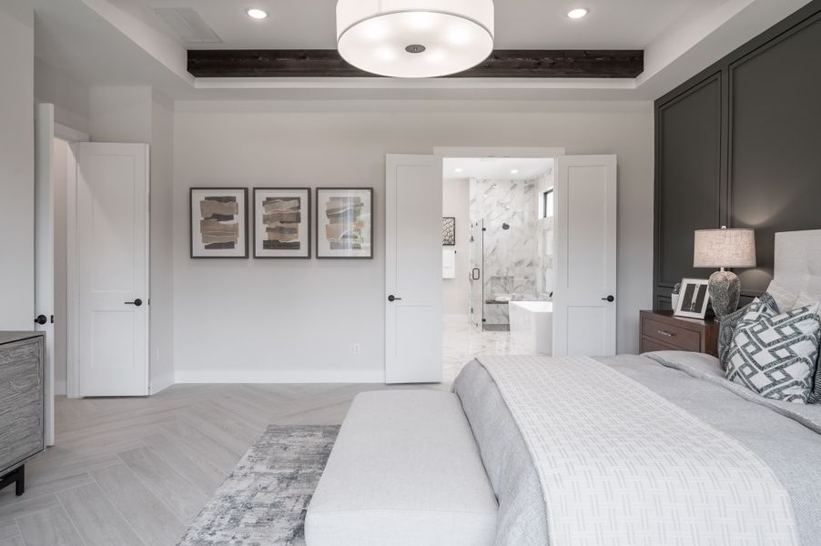 Representative furnished interior of a home built from the Carignan by Tri Pointe Homes in Sienna 80′, Missouri City (Image 34).