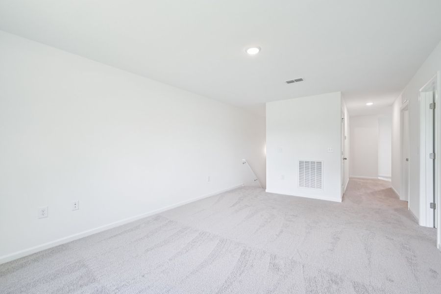 Representative unfurnished interior of a home built from the Meadow by Ashton Woods in Middleton Farms, Middlesex (Image 18).