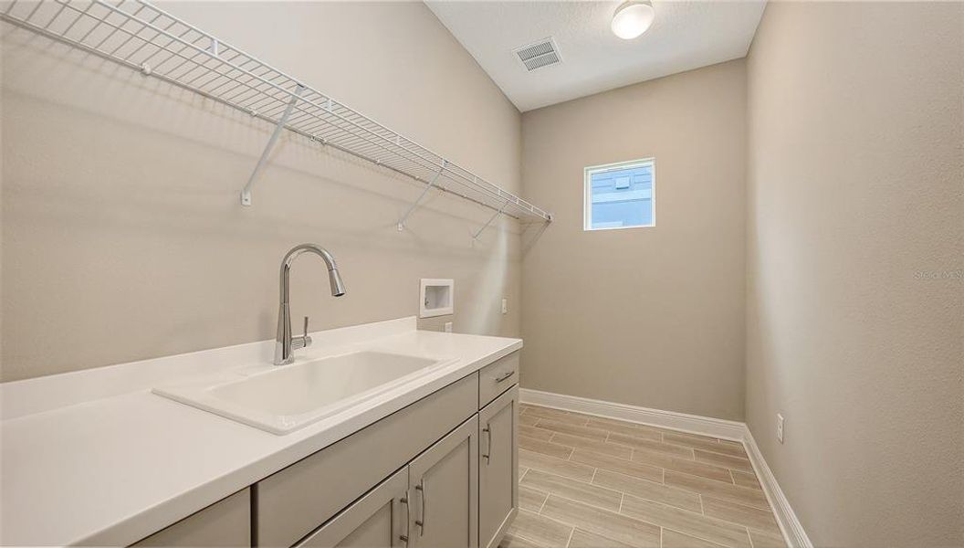 Furnished interior view inside a new home in Wildleaf, Parrish (Image 7).