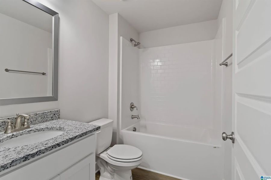 Representative furnished interior of a home built from the 1635-C by Adams Homes in Kirkland Farms, Alachua (Image 17).