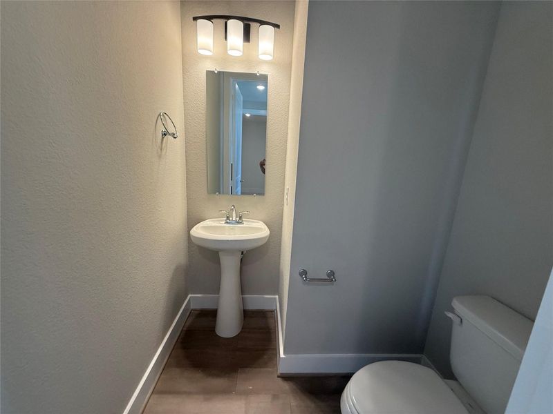 Spacious powder bath on the first floor.