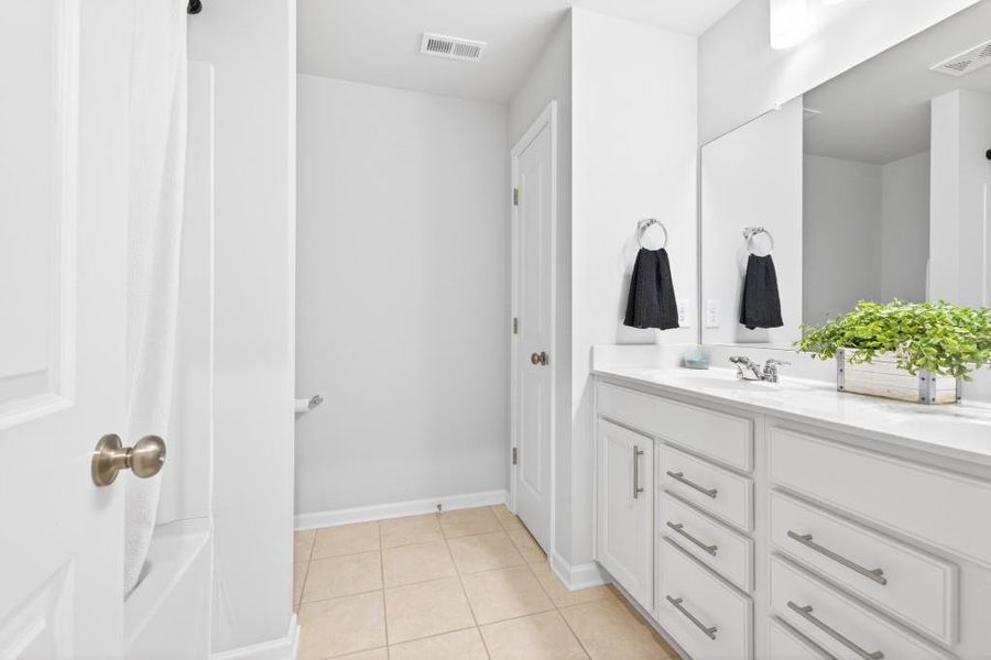 Furnished interior view inside a new home in Reunion, Flowery Branch (Image 49).