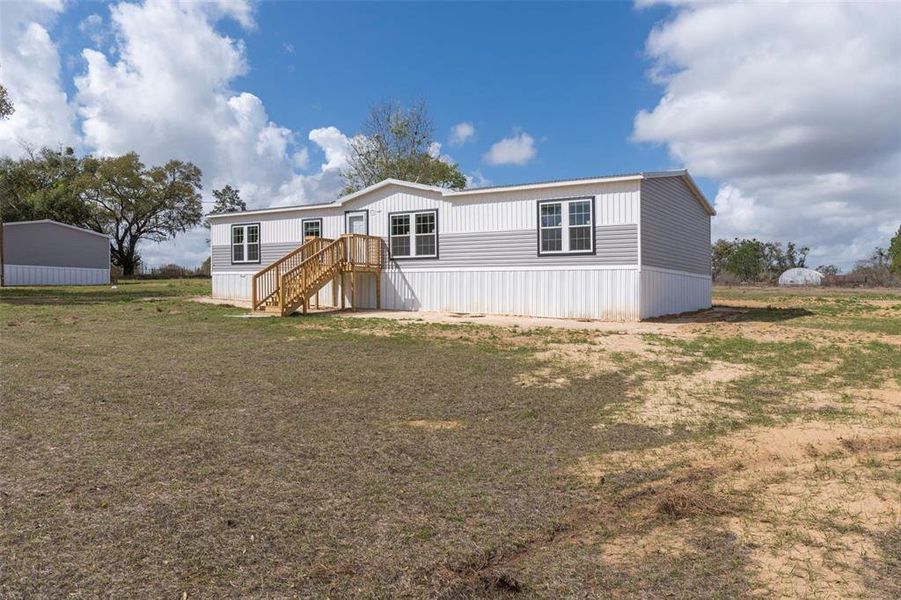 Exterior details and patio area of a home in , Dade City (Image 24).