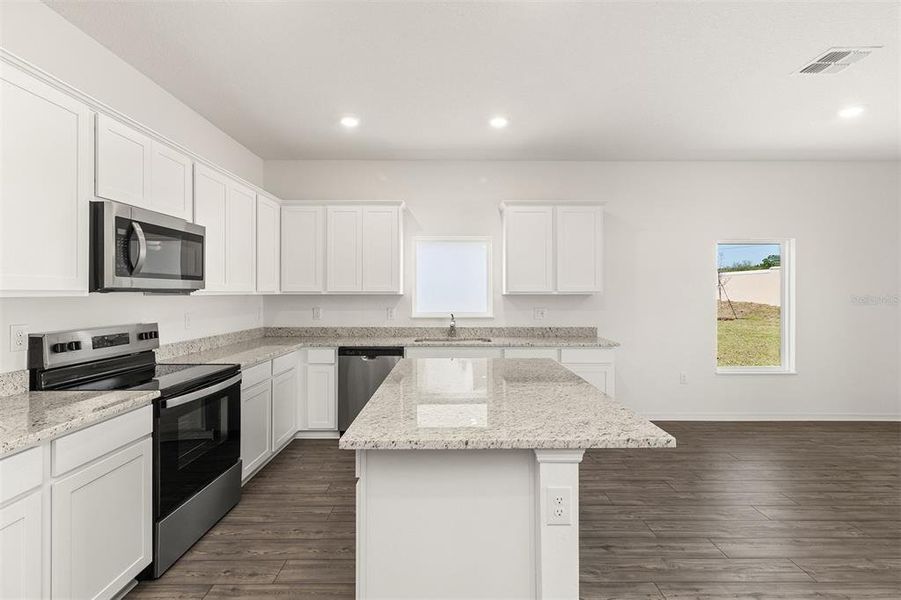 Furnished interior view inside a new home in Peach Crossings, Winter Haven (Image 5). Furnished interior view inside a new home in Peach Crossings, Winter Haven (Image 5).