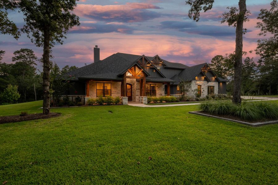 Front exterior of a new home in , Montgomery, TX, highlighting curb appeal (Image 21). Front exterior of a new home in , Montgomery, TX, highlighting curb appeal (Image 21).