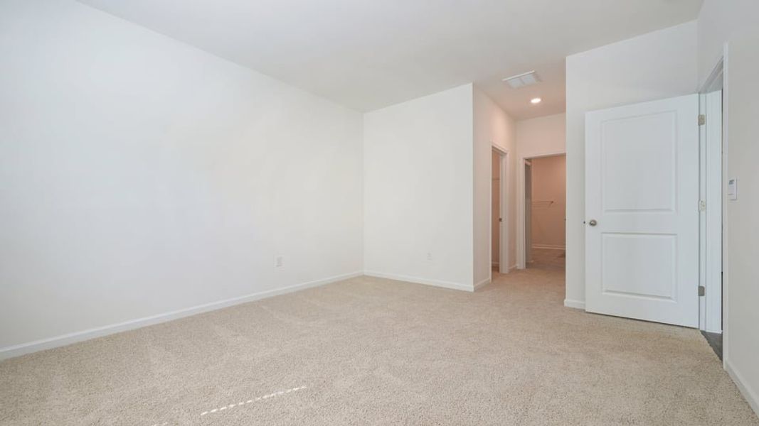 Spacious, unfurnished interior of a new home in The Villas at Laurel Oaks, Sanford (Image 27).