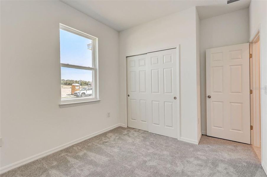 Spacious, unfurnished interior of a new home in Sunset Lakes Estates, Mascotte (Image 24).