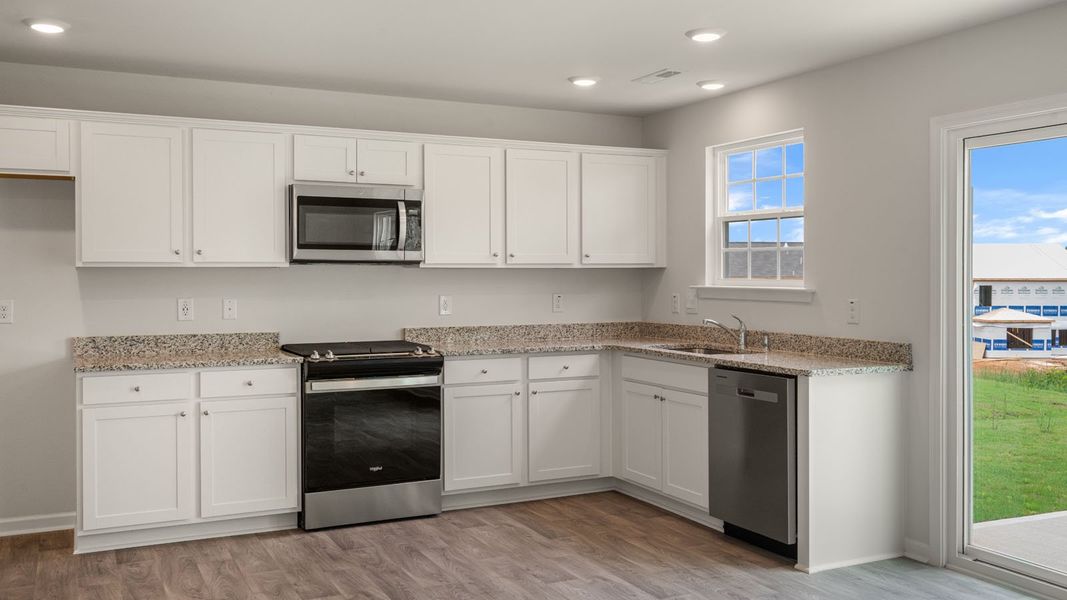 Furnished interior view inside a new home in Faircrest, Greensboro (Image 4). Furnished interior view inside a new home in Faircrest, Greensboro (Image 4).