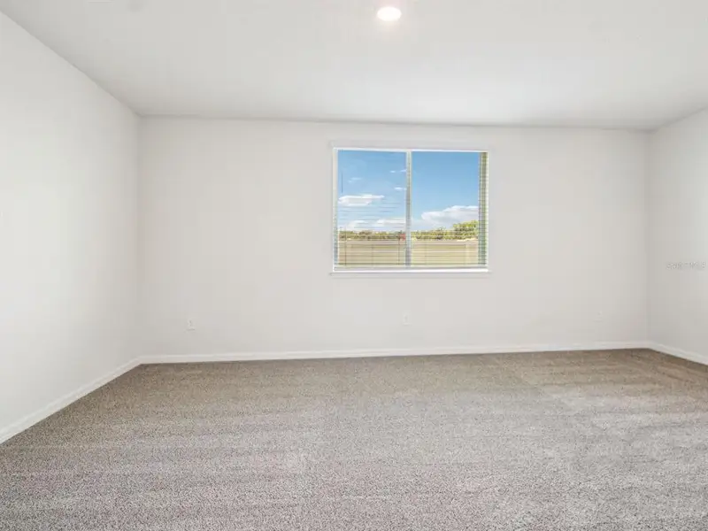 Spacious, unfurnished interior of a new home in Oakfield Trails - Signature Series, Parrish (Image 11).