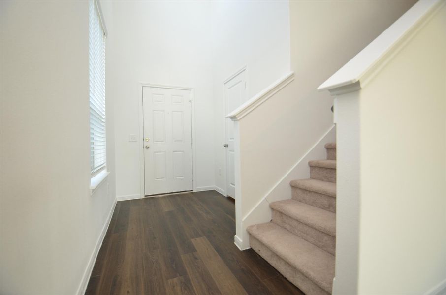Bright entryway with high ceilings Bright entryway with high ceilings