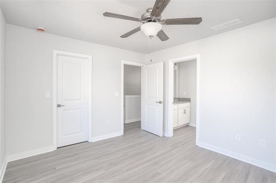 Spacious, unfurnished interior of a new home in The Cottages at East Lanier, Fairburn (Image 5).