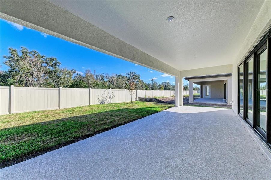 Exterior details and patio area of a home in Crosswind Point, Parrish (Image 2). Exterior details and patio area of a home in Crosswind Point, Parrish (Image 2).