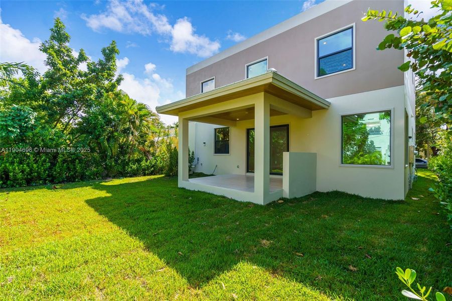 Exterior details and patio area of a home in , Miami (Image 3).