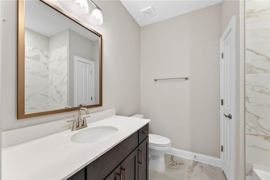 Furnished interior view inside a new home in The Courtyards at Bailey Farms, Dacula (Image 4).