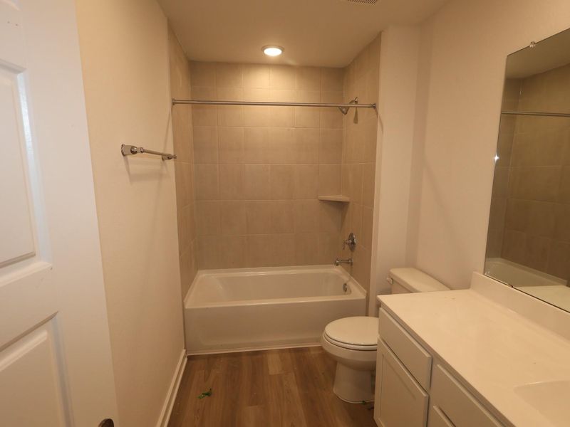 Furnished interior view inside a new home in Pinewood at Grand Texas, New Caney (Image 8).