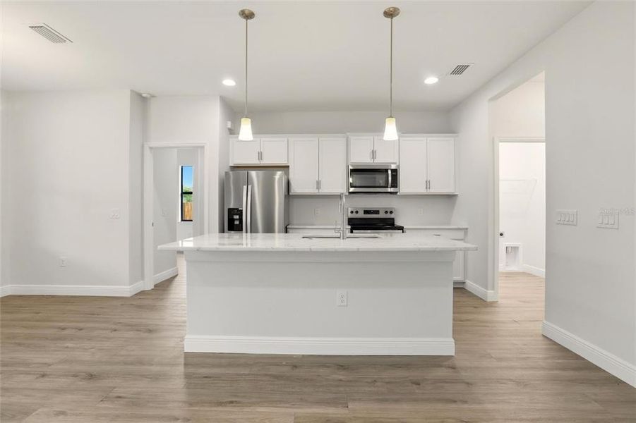 Furnished interior view inside a new home in , North Port (Image 9).