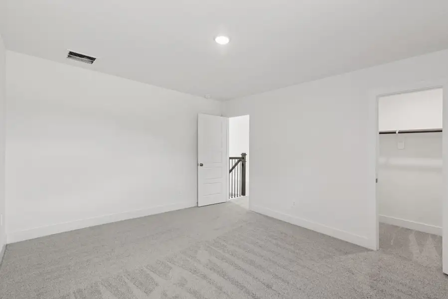 Spacious, unfurnished interior of a new home in Sorella, Tomball (Image 4).