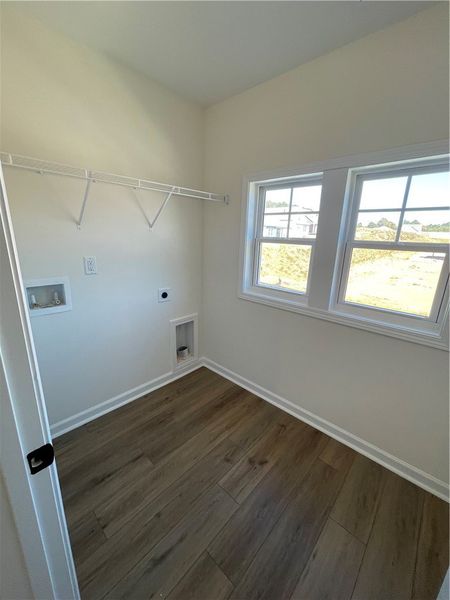 Spacious, unfurnished interior of a new home in Springwood Grove, Central (Image 24).