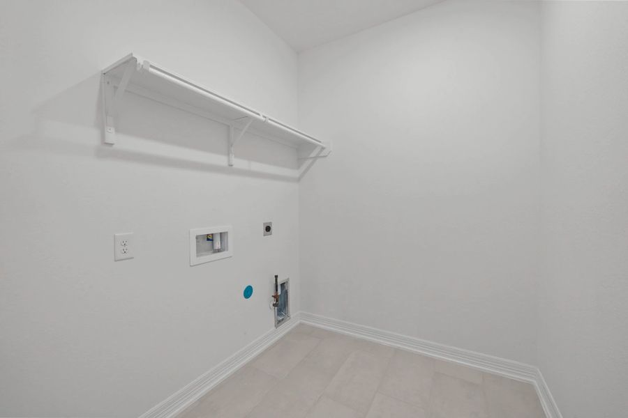 Laundry room. Sample product photo. Actual exterior and interior selections may vary by homesite. Photo may be virtually staged.
