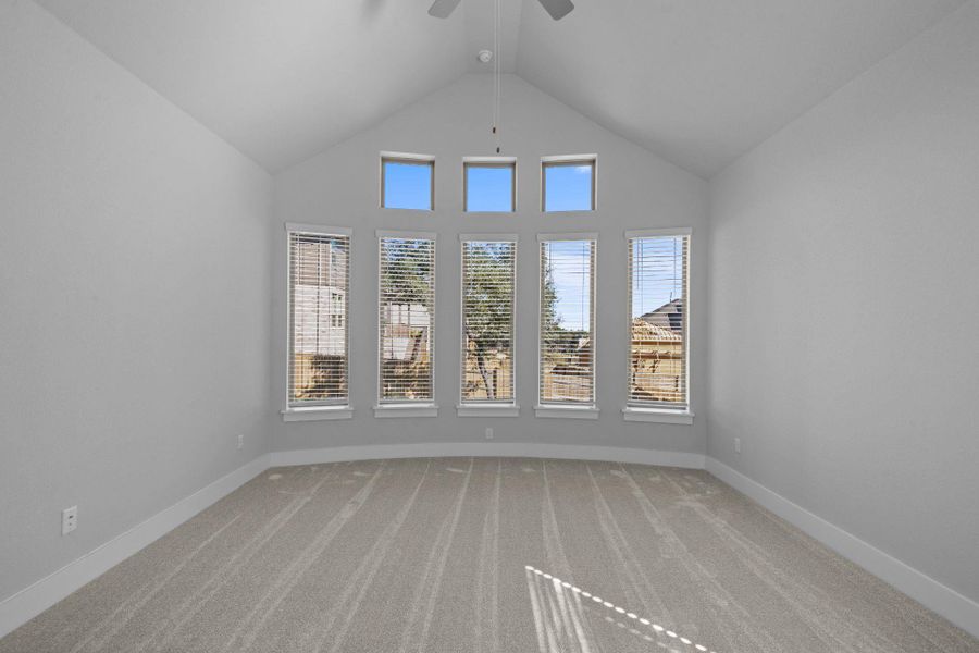 Primary Bedroom with elevated ceiling