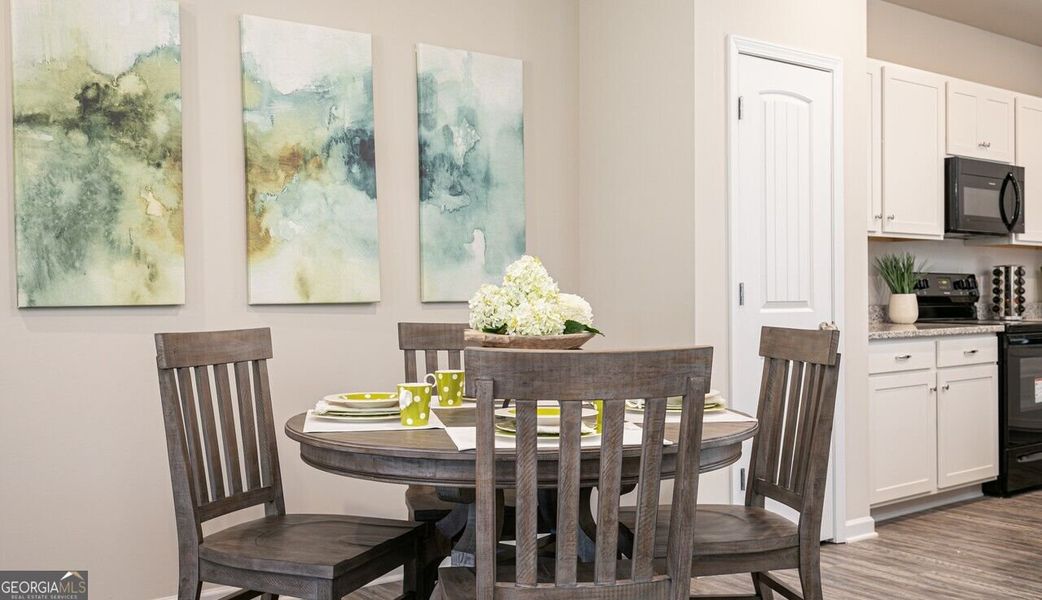 Furnished interior view inside a new home in The Cottages of Silvertown, Thomaston (Image 6).
