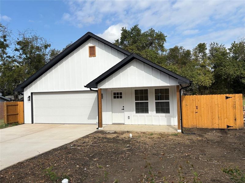 Front exterior of a new home in , Cooper, TX, highlighting curb appeal (Image 1).
