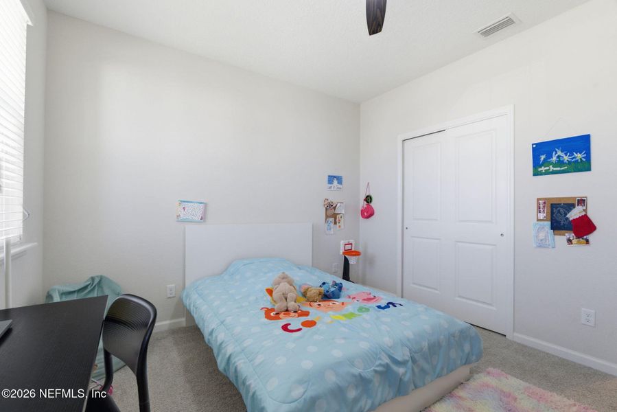 Furnished interior view inside a new home in RiverTown - Settlement, St. Johns (Image 19).
