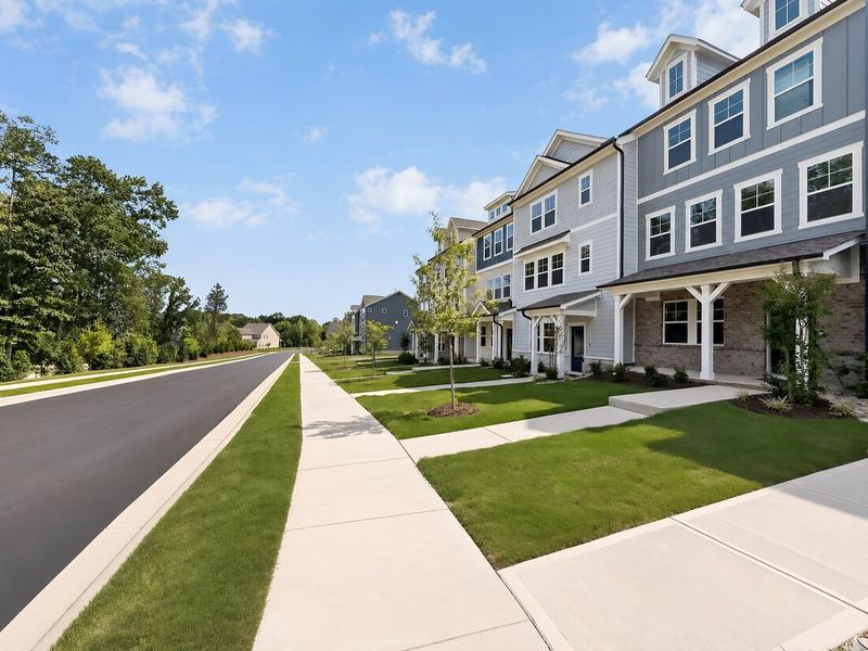 Front exterior of a new home in Silverstone, Knightdale, NC, highlighting curb appeal (Image 25).