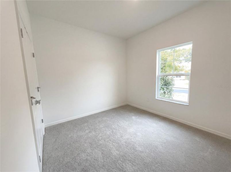 Spacious, unfurnished interior of a new home in Grand Park, Dunnellon (Image 18).