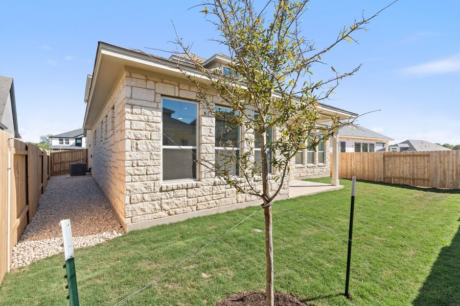 Exterior details and patio area of a home in Persimmon, Buda (Image 4). Exterior details and patio area of a home in Persimmon, Buda (Image 4).