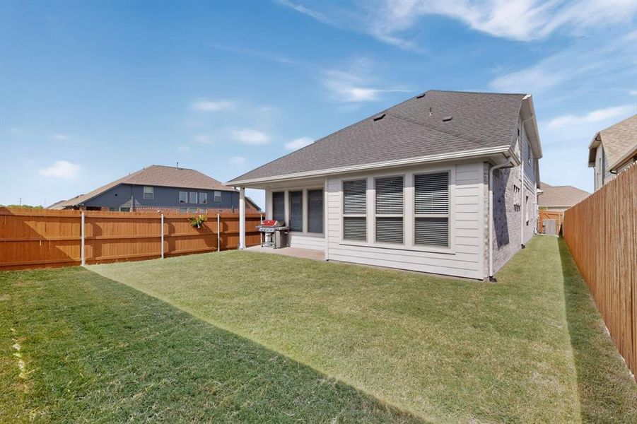 Exterior details and patio area of a home in Heartland, Heartland (Image 20).