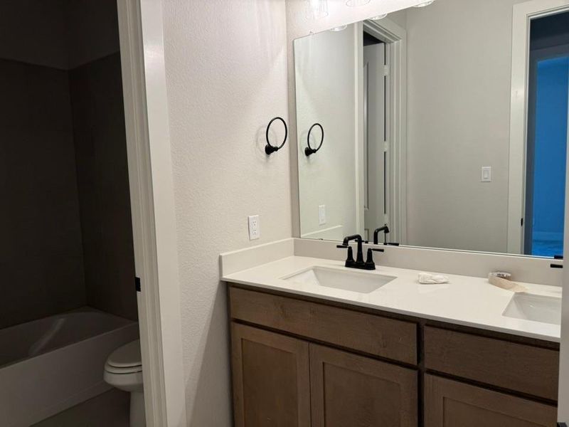 Furnished interior view inside a new home in Rocky Top, Krum (Image 7).