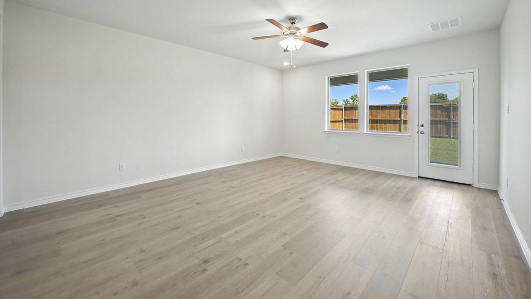 Representative unfurnished interior of a home built from the Tanzanite by D.R. Horton in Bel Air Village, Sherman (Image 10).