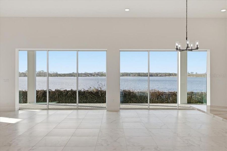Spacious, unfurnished interior of a new home in Shorefront Cove, Winter Garden (Image 7).