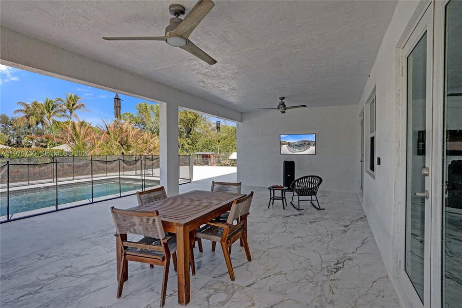 Exterior details and patio area of a home in , Loxahatchee (Image 37).