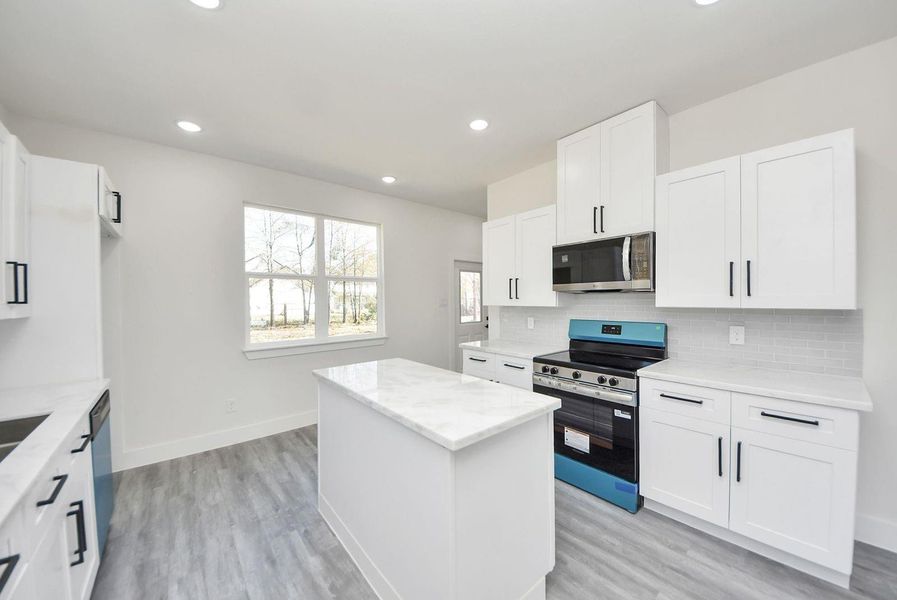 Furnished interior view inside a new home in , Conroe (Image 11).