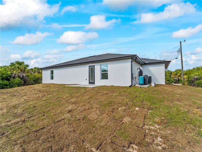 Exterior details and patio area of a home in , Port Charlotte (Image 38).