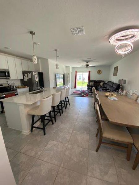Furnished interior view inside a new home in Storey Creek, Kissimmee (Image 4).