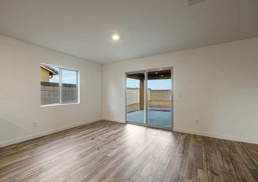 The dining room is open to the kitchen and family room.