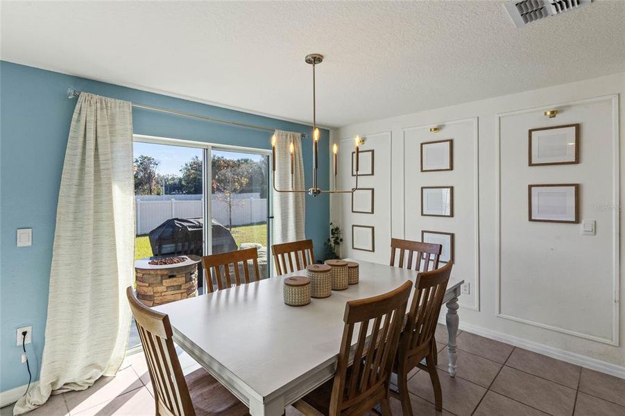 Dining Room off the kitchen with sliding glass doors to back yard