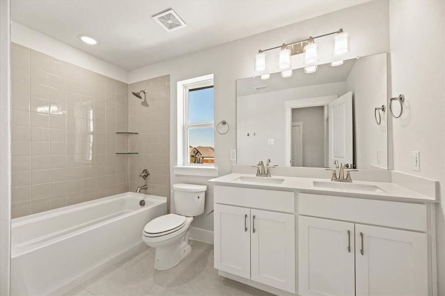 Guests will enjoy their own space in this lovely guest bath!