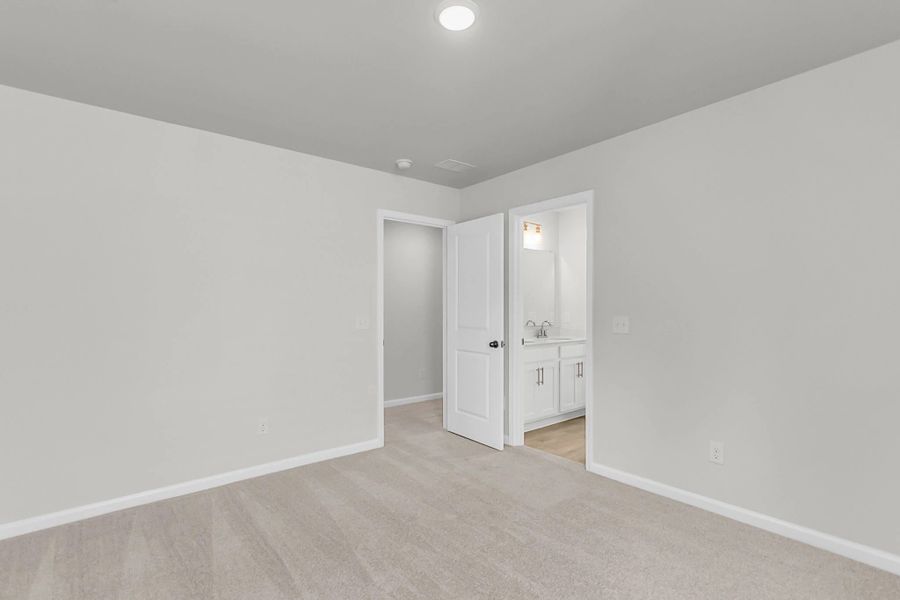 Secondary bedroom connects to a Jack-and-Jill bathroom