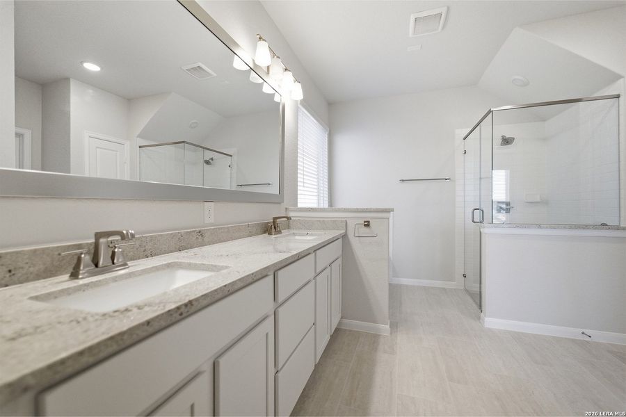 Furnished interior view inside a new home in The Woodlands at Medina Hills, Mico (Image 13).